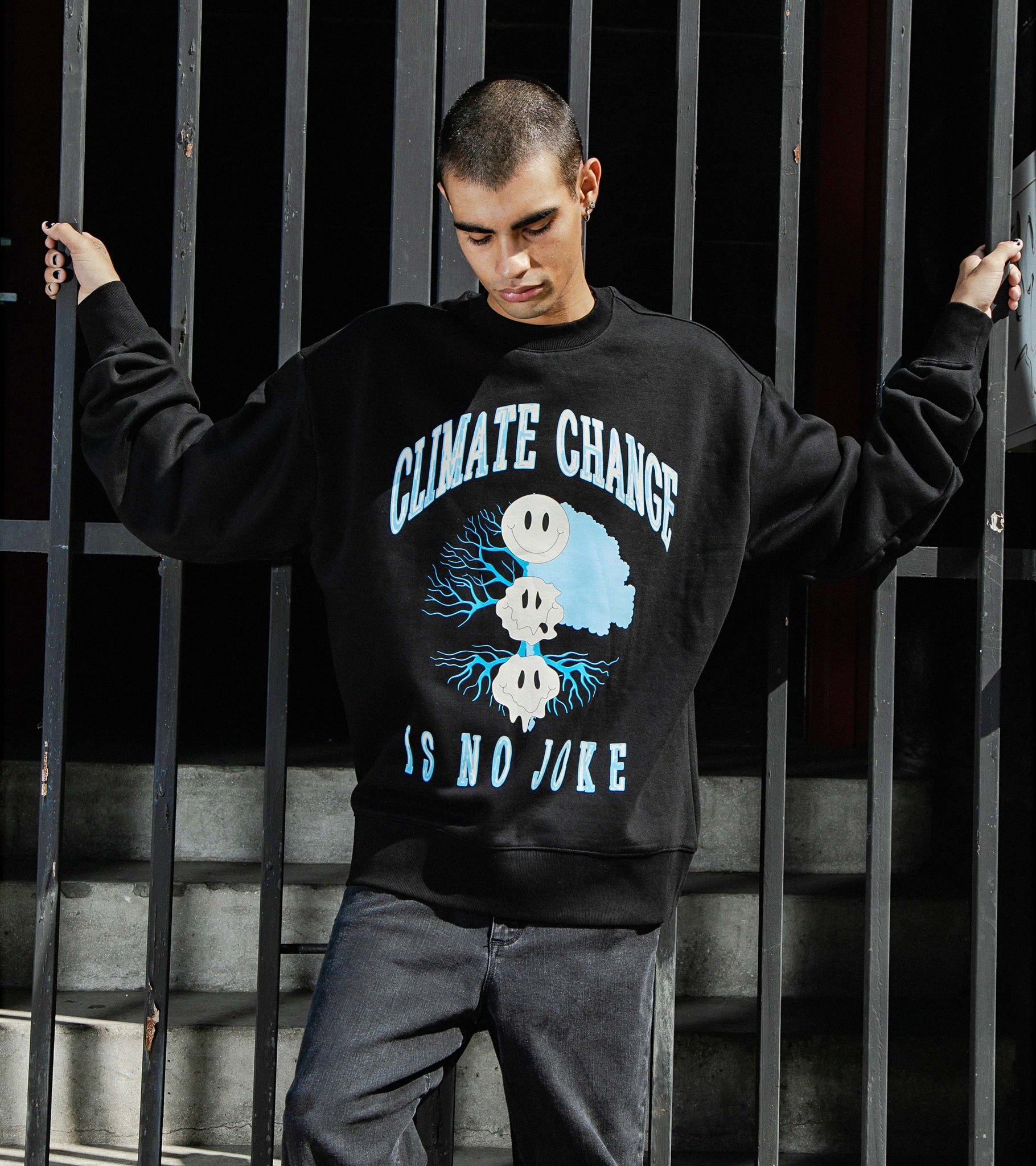 CLIMATE CHANGE IS NO JOKE OVERSIZED CREWNECK SWEATSHIRT BLACK