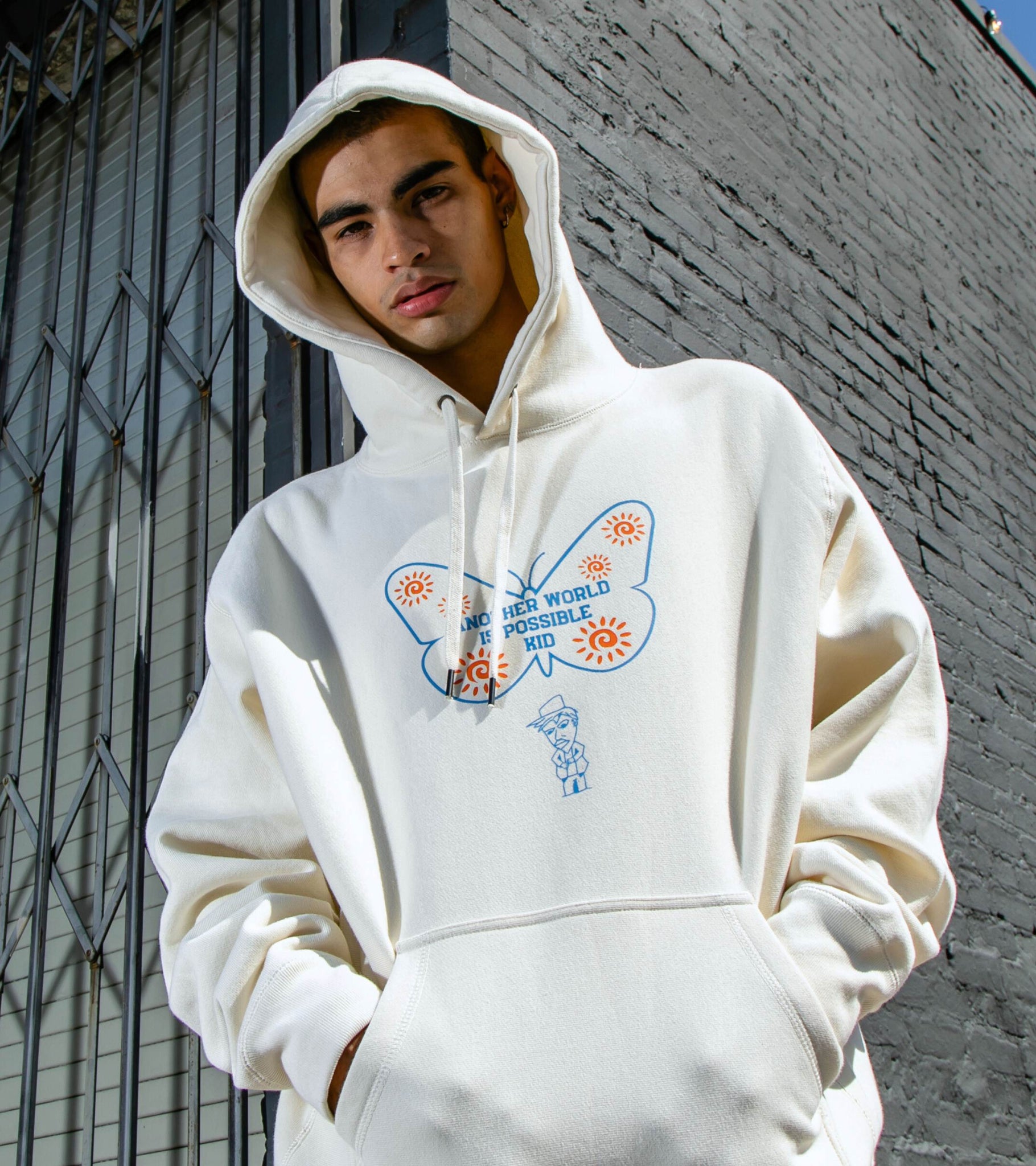 ANOTHER WORLD IS POSSIBLE KID HEAVYWEIGHT HOODIE BONE